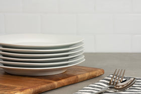 10 Strawberry Street Simply White 7.5-inch plate on a dining table, ready for gatherings.