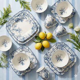 Adelaide blue floral plates on dining table create an elegant tablescape.