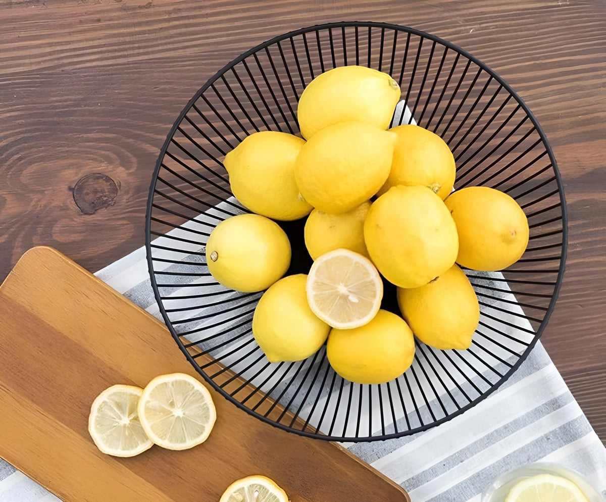 7UYUU round wire bowl showcases bananas neatly, compact in small kitchen spaces.
