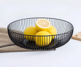 7UYUU fruit bowl on counter keeps lemons visible and accessible for quick prep.