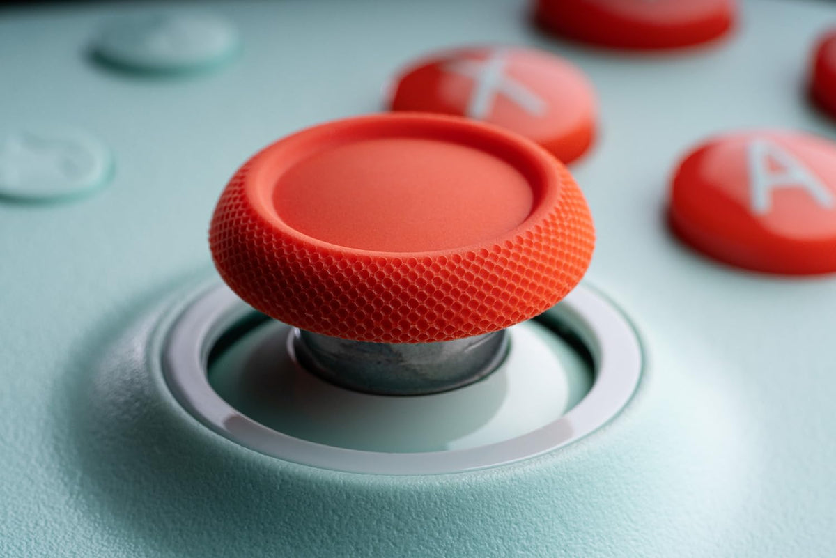 8BitDo Ultimate 2C Mint grip and controls support precise actions.