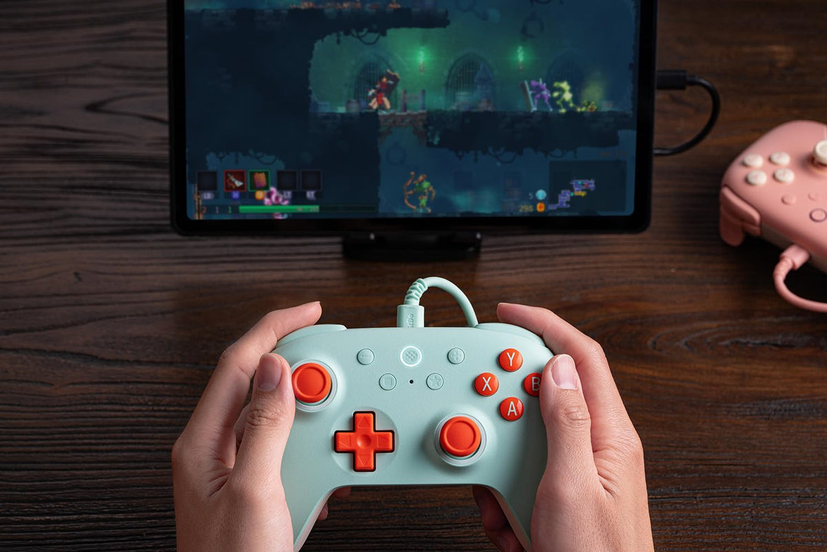 8BitDo Ultimate 2C Mint rear profile emphasizes durable wired connection.