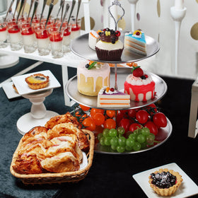 Gerrii wedding dessert display in silver complements decor