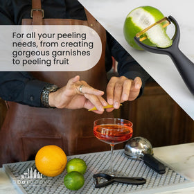 A Bar Above Gold Citrus Peeler in polished stainless steel finish.