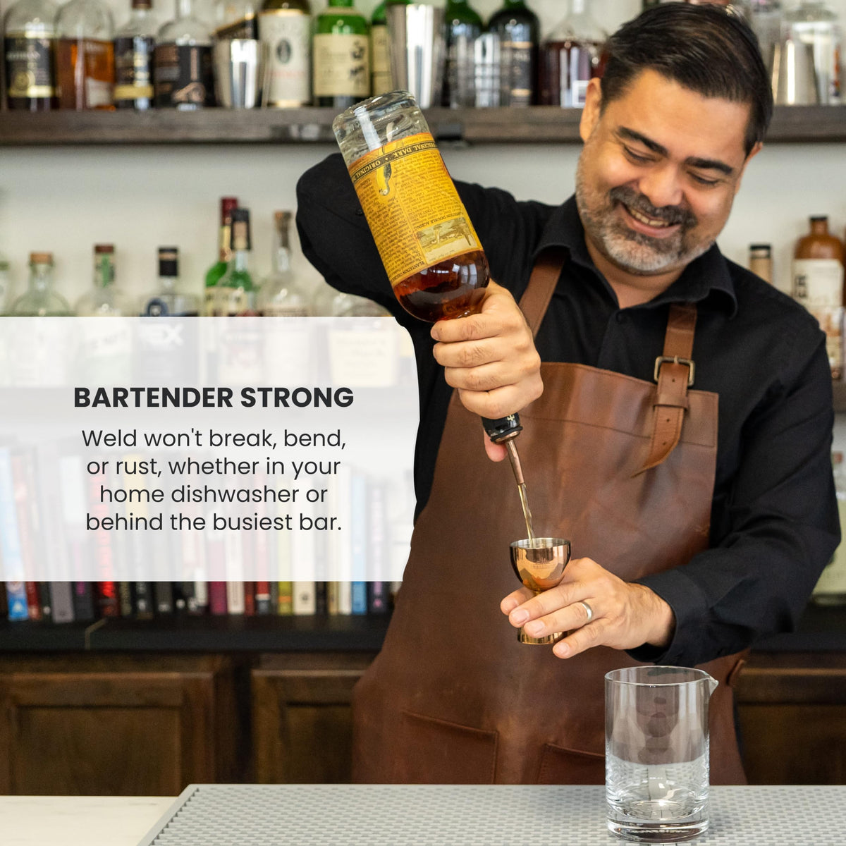 A Bar Above Premium Bell Jigger side-angle shows heavy-duty steel and sturdy base.