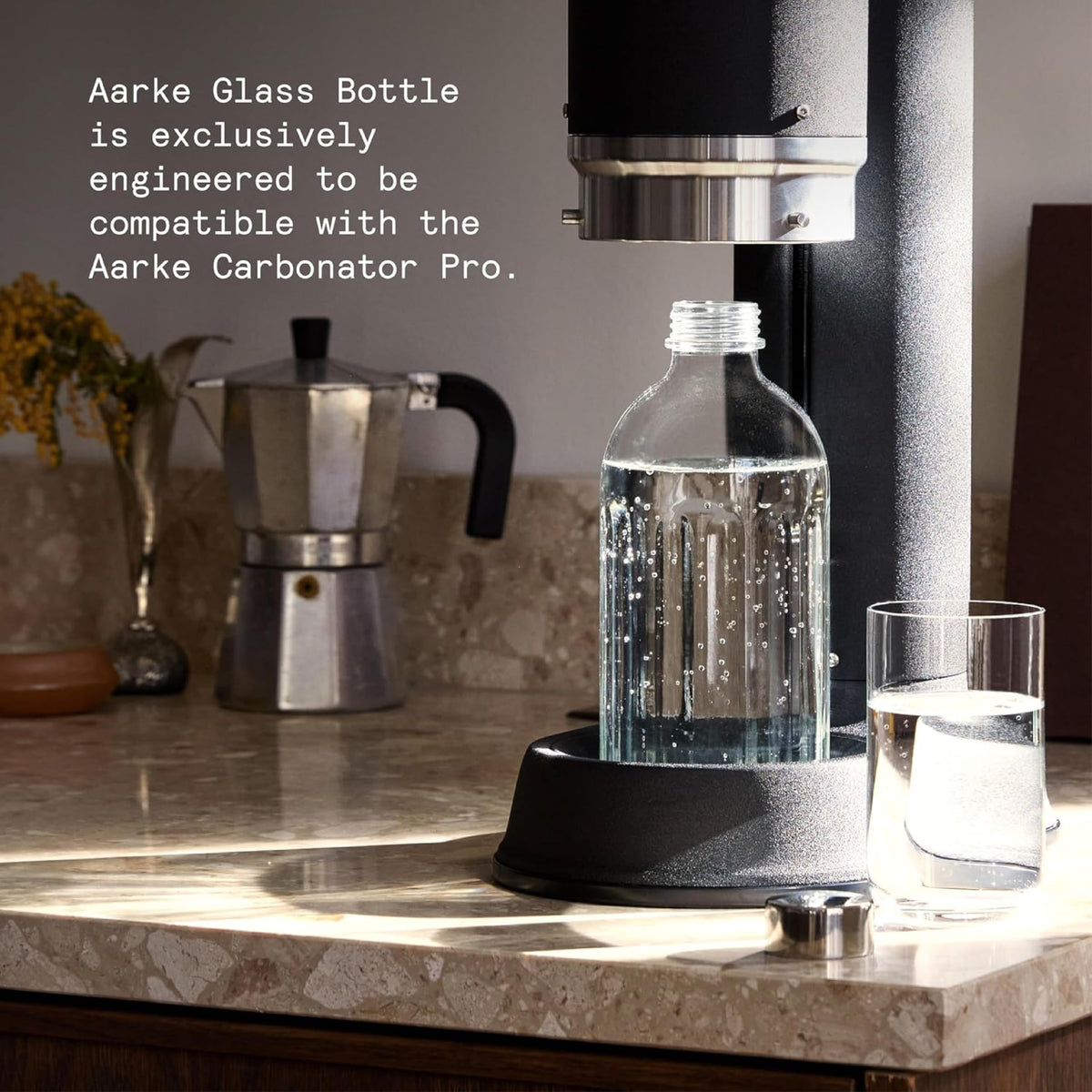 Aarke bottle featuring a stainless steel cap for secure sealing.