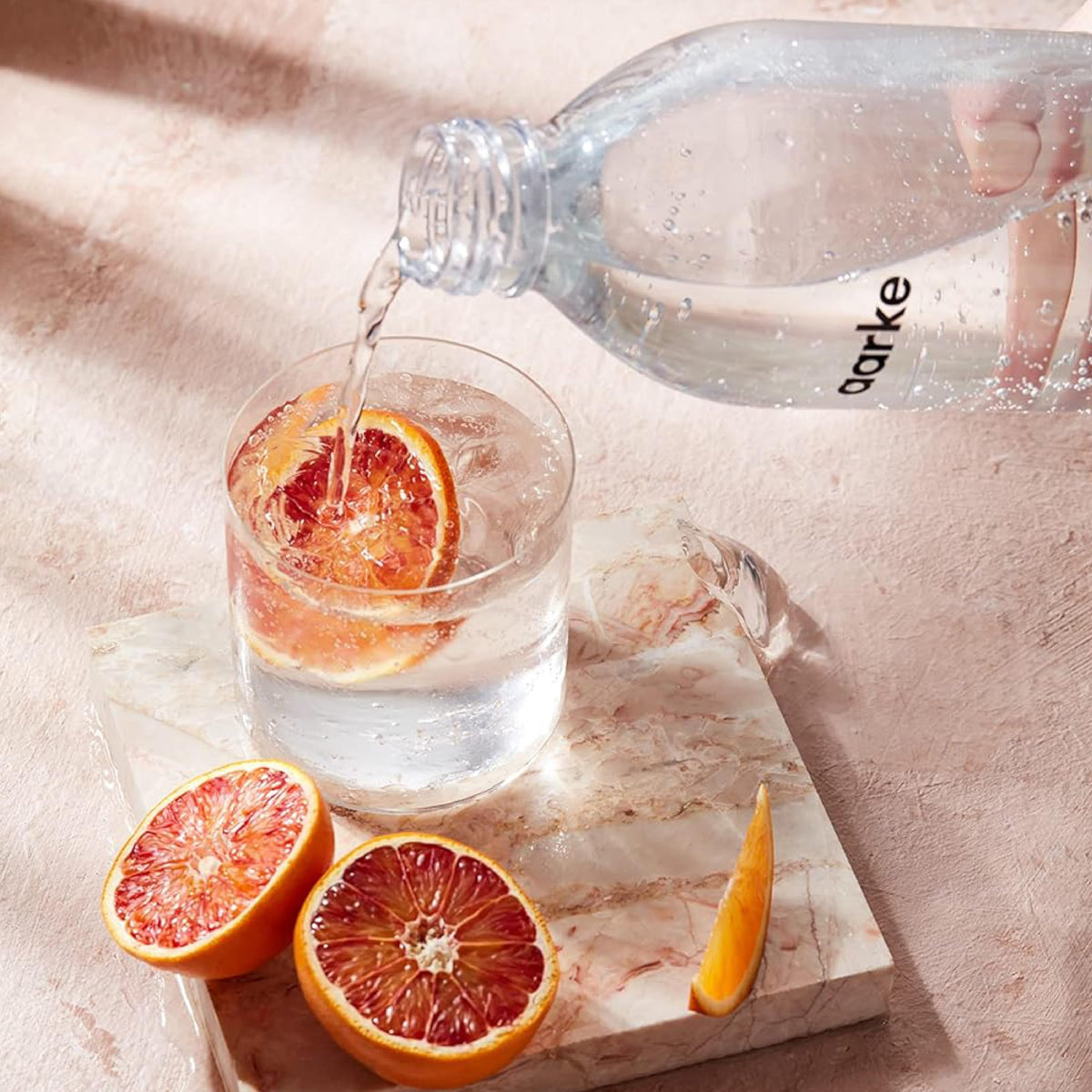 Aarke glass bottle shows beverage level up to the marked line.