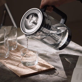Aarke Purifier two-size pitcher setup fitting kitchen space.