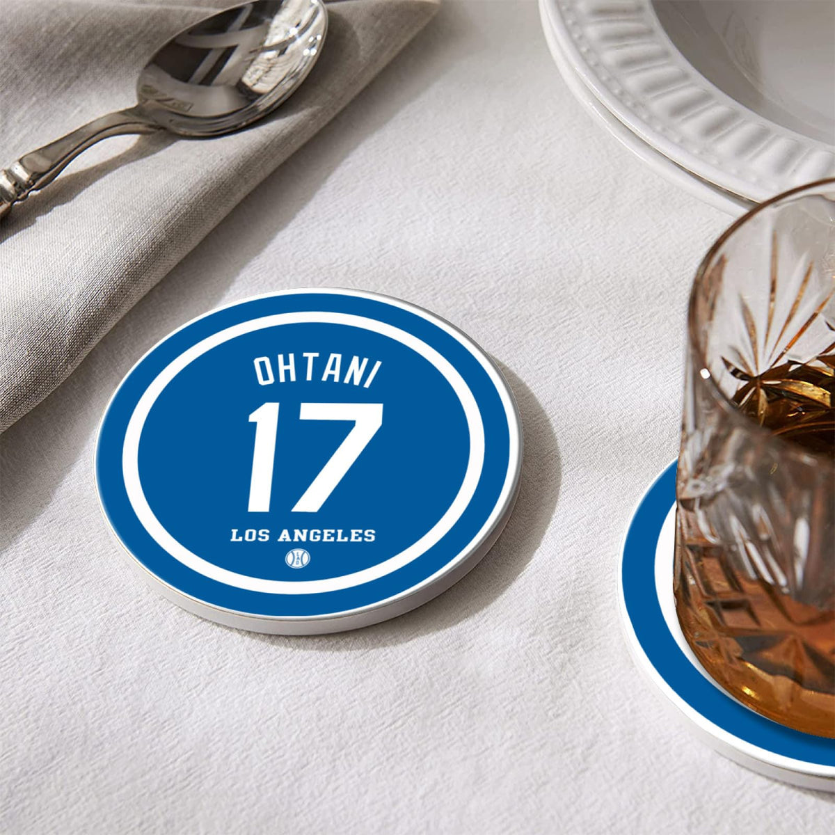 AARONIE Dodger coaster with non-slip cork bottom protects surfaces and prevents slips.