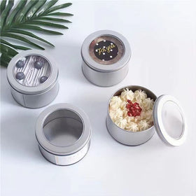 Abgream tin containers with clear tops simplify item identification.