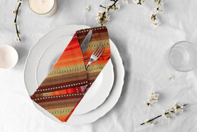 ACCENTHOME Salsa Stripe Napkins stacked for a formal table setting with mitered corners