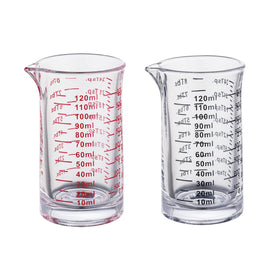 Ackers 4oz glass measuring cup with V-spout for precise, drip-free pours.