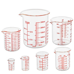 Ackers BORO3.3 7-piece glass measuring cups with a drip-free spout for precise pours.