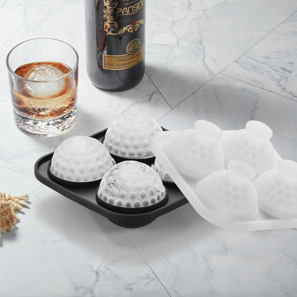 ACOOKEE large 2.2-inch spheres ice tray designed for cocktails and whiskey.