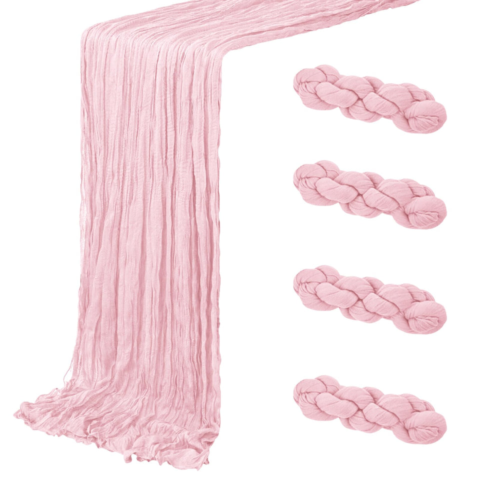ACSUIT light pink cheesecloth table runner fully expanded, ideal for elegant wedding tabletops.