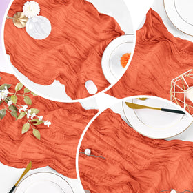 ACSUIT orange cheesecloth table runner used for party decor ideas.
