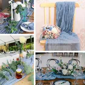 ACSUIT wedding reception table decorated with dusty blue cheesecloth runner