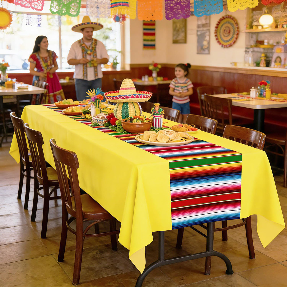 Actilize serape tablecloth in pink adds festive flair and quick post-party cleanup.