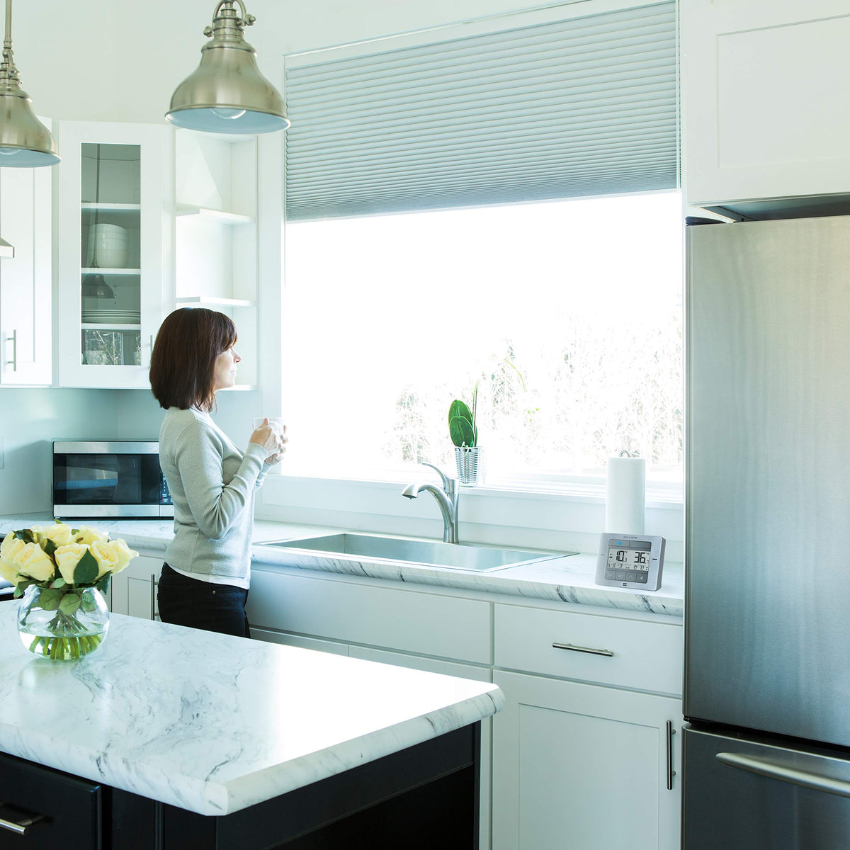 AcuRite alarm display emitting audible and visual alerts for temperature drift.