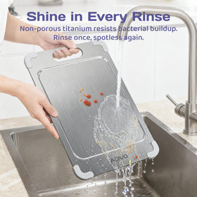 ADIVO titanium cutting board features an enlarged oval handle for easy lifting.