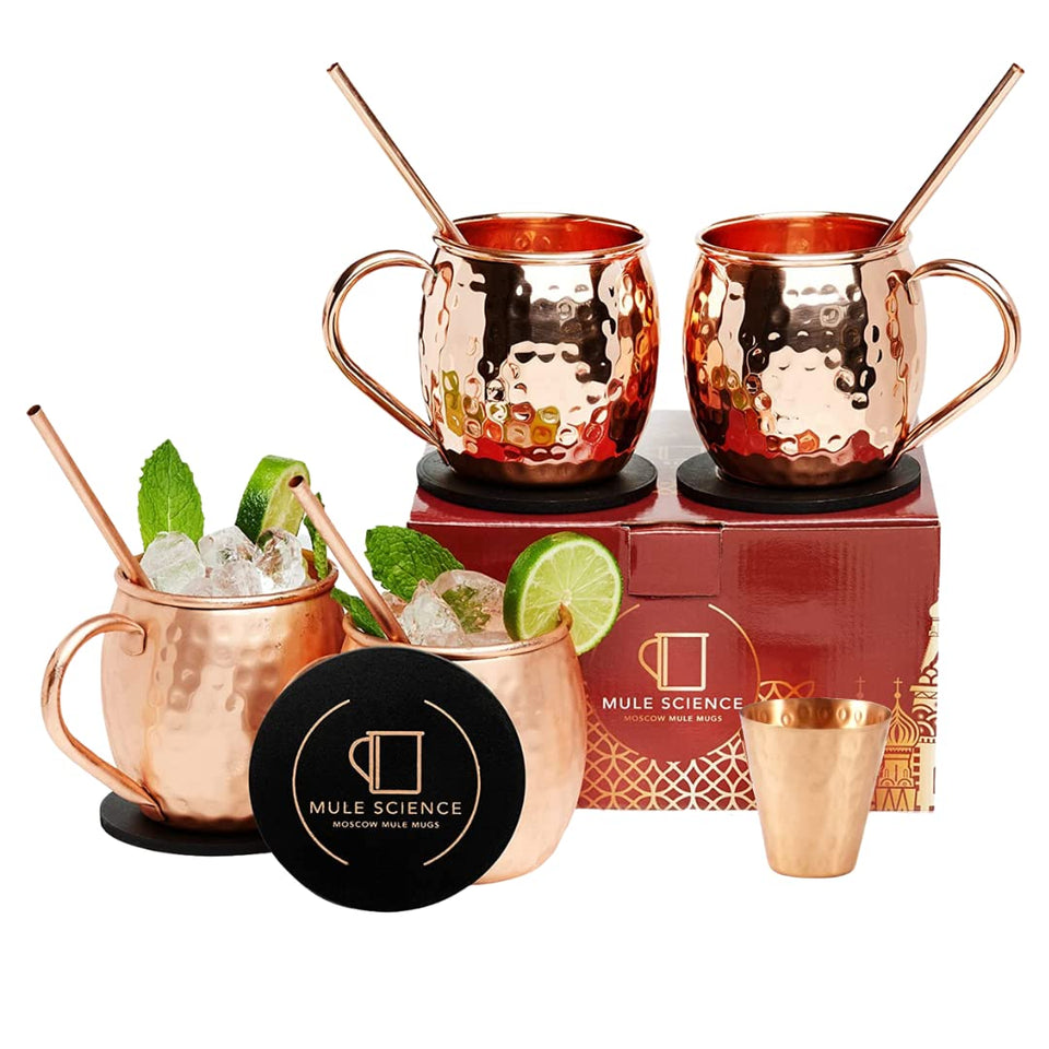 Advanced Mixology Mule Science mugs-4-set on a bar, 19 oz capacity highlighted for entertaining.