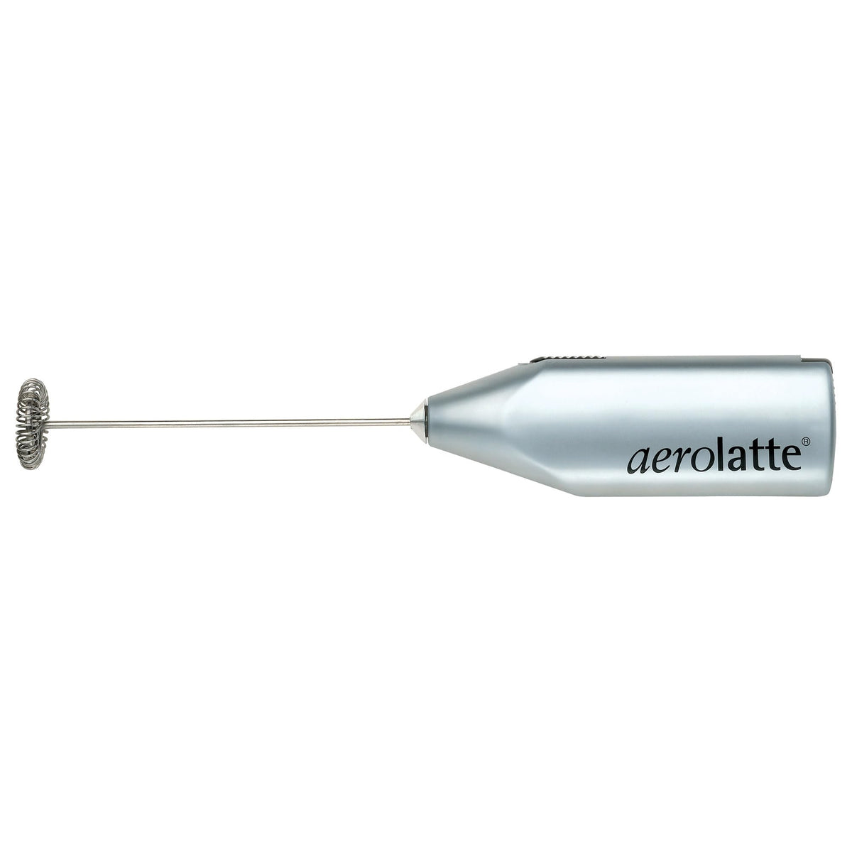 Aerolatte milk frother in action creates silky foam on coffee.