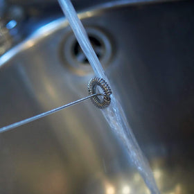 Aerolatte Frother froths hot and cold milk without external power.