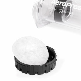 AeroPress biodegradable filter paper emphasizes eco-friendly, compostable brewing.