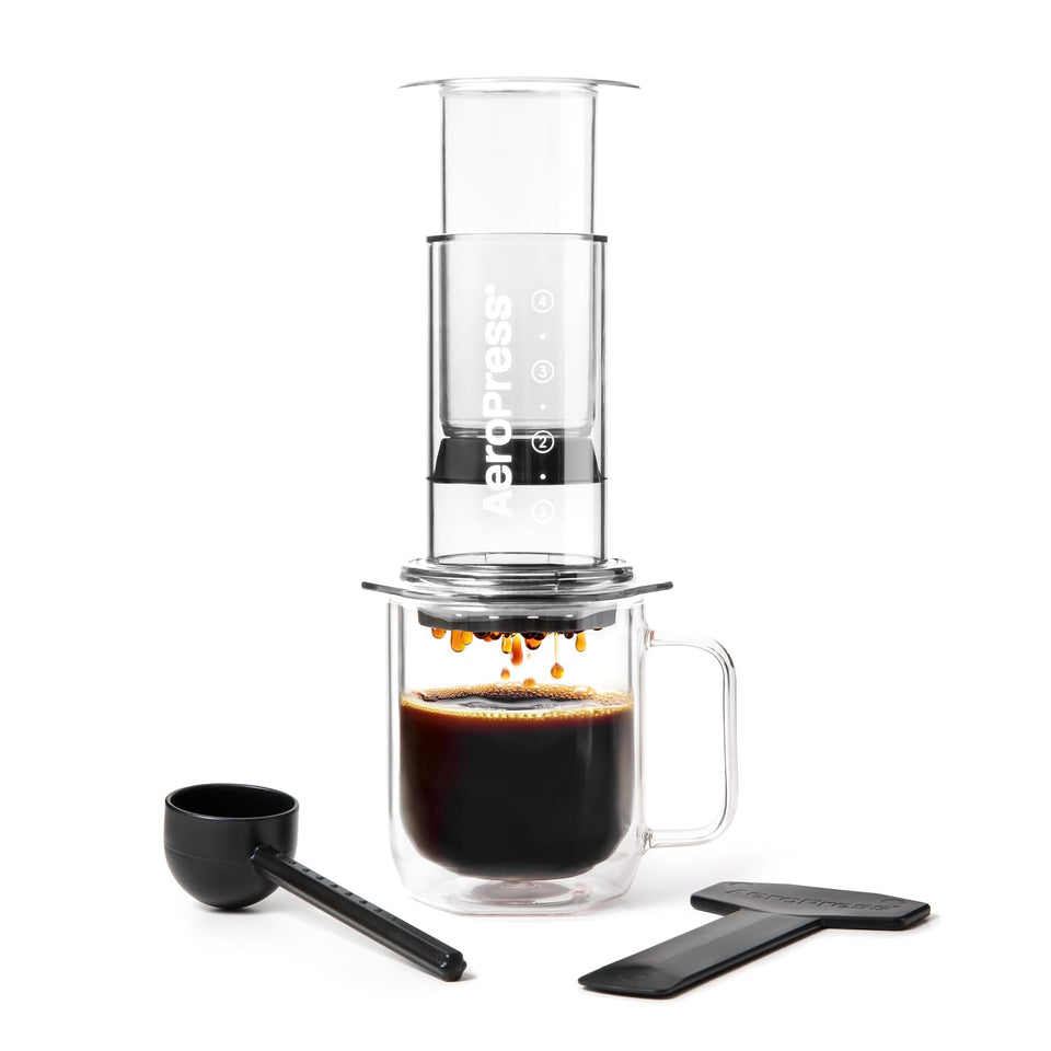AeroPress Clear Coffee Press front view showcasing portable, shatterproof design for travel.