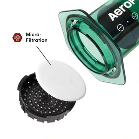 Close view of AeroPress Clear Green's Tritan body showing extraction visibility and durability.