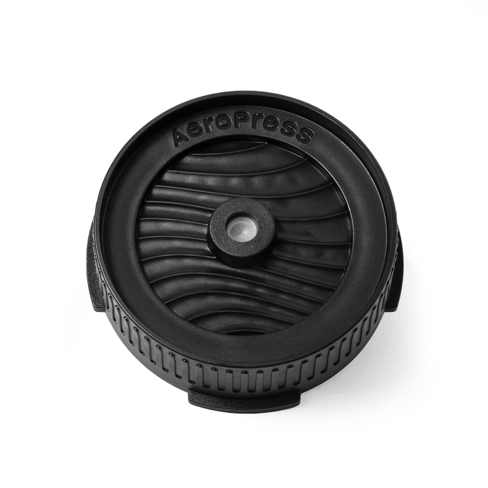 AeroPress Flow Control Cap close-up valve demonstrates precise drip control for customizable brews.