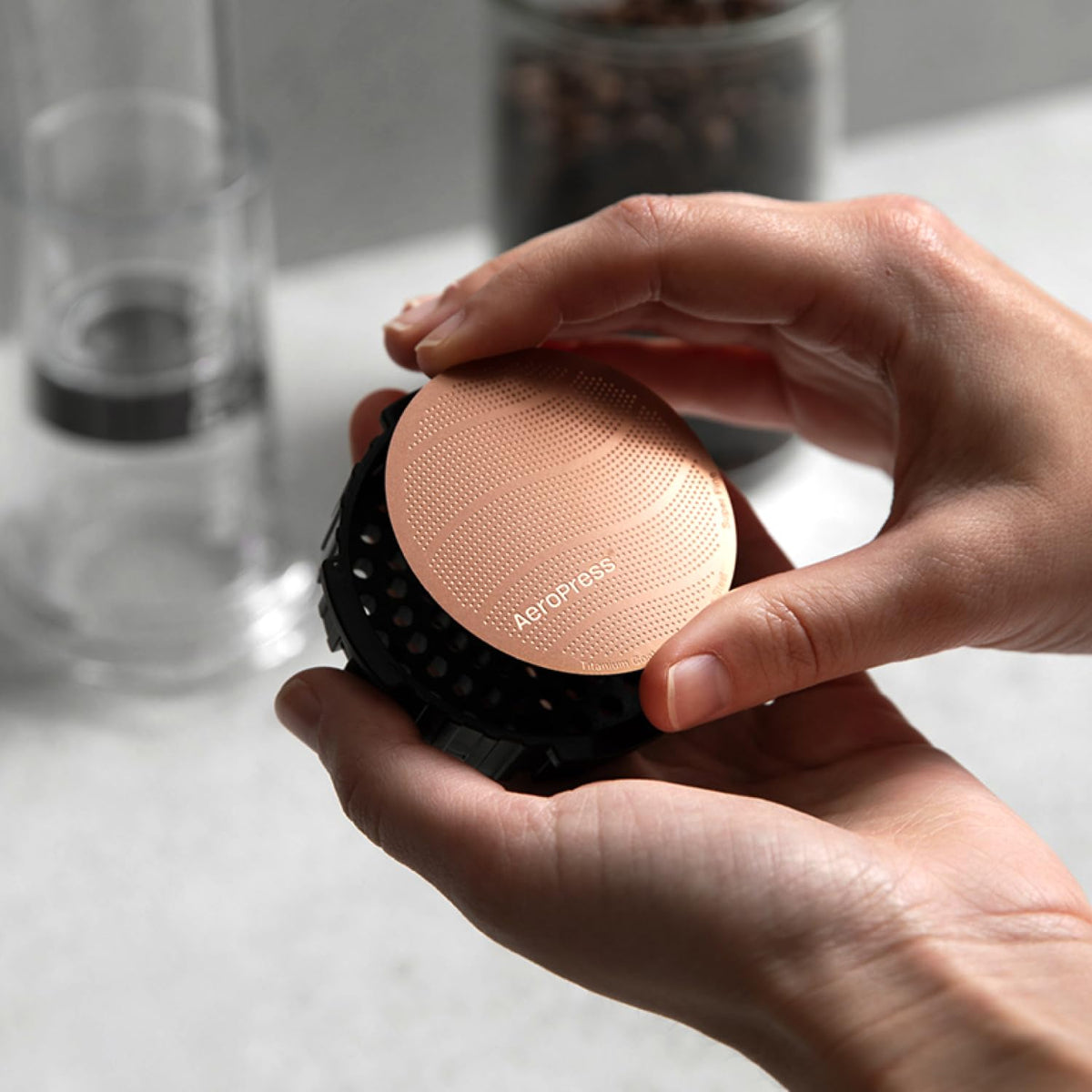 Close-up of AeroPress Gold Tone filter mesh for minimal grit and rich oils.