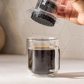 AeroPress micro-filtration closeup reveals ultra-thin, tightly woven holes.