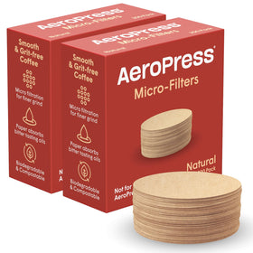 AeroPress natural paper micro-filters closeup; round 400-count 2-pack for clean brews