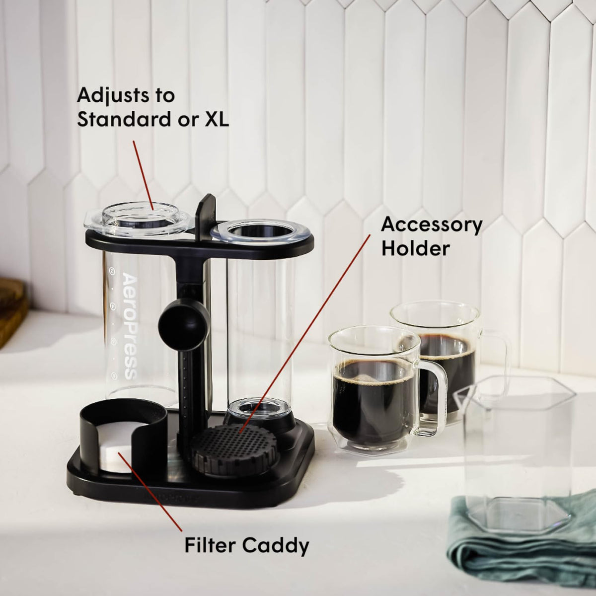 AeroPress Organizer Stand side view highlights dedicated slots for coffee maker, scoop, and filters.