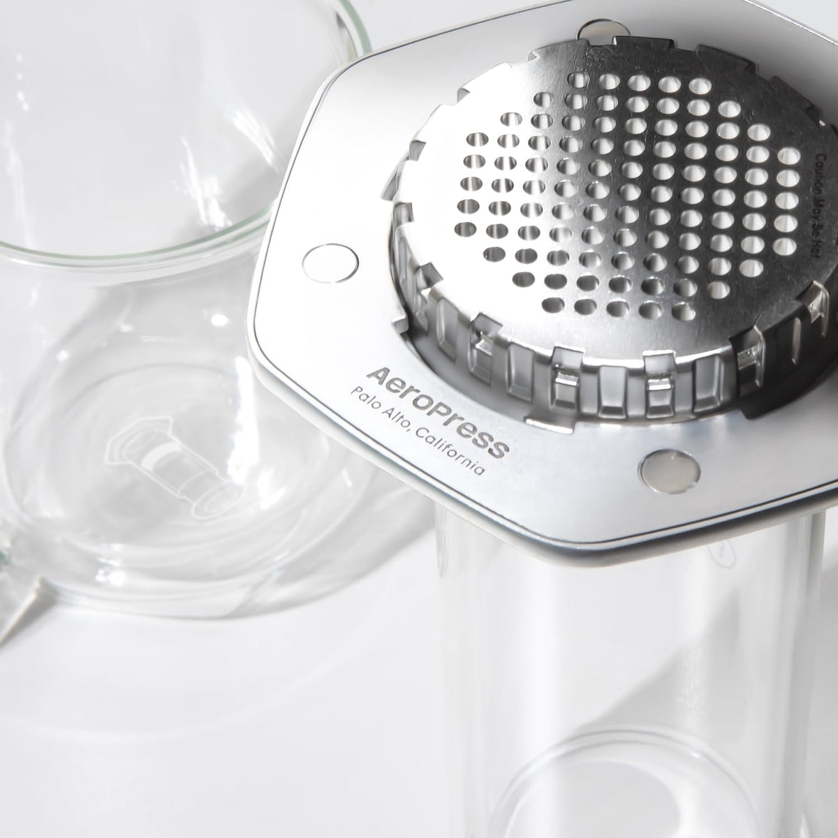 AeroPress Premium anodized aluminum body in a sleek silver finish.
