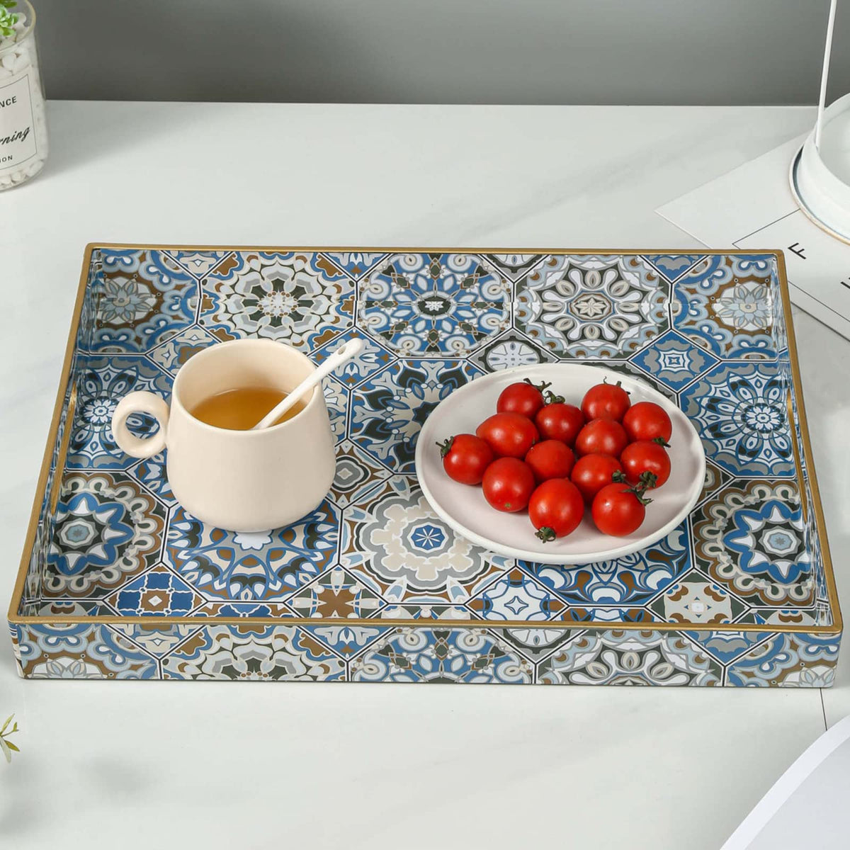 AGIOTA serving tray with vintage print for chic entertaining.