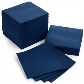 AH American Homestead Navy Cocktail Napkins folded for an elegant table setting.