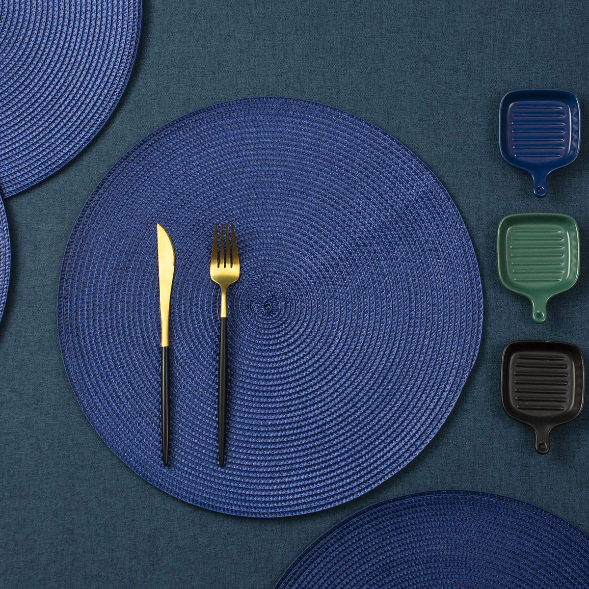 AHHFSMEI indoor dining setup showing navy placemats adding color and warmth