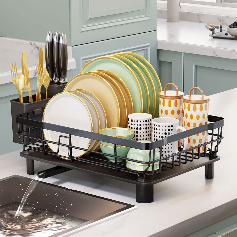 AIDERLY dish drying rack with extendable drain spout directing water to the sink.