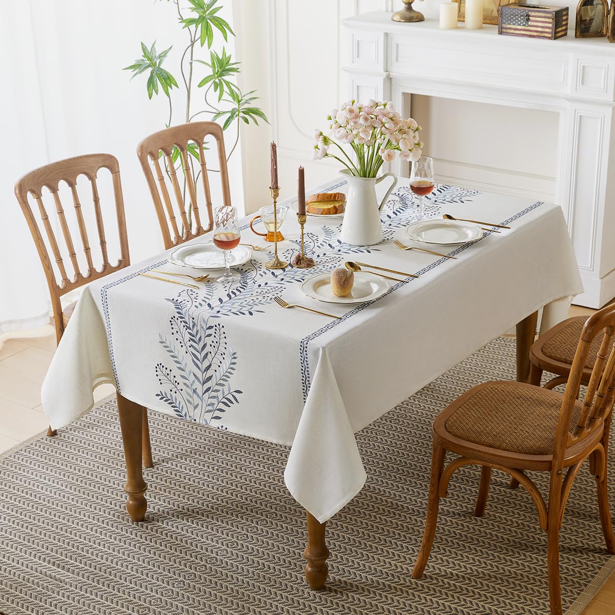 Aiimart waterproof tablecloth protecting surfaces during meals with easy cleaning.