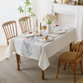 Aiimart waterproof tablecloth protecting surfaces during meals with easy cleaning.