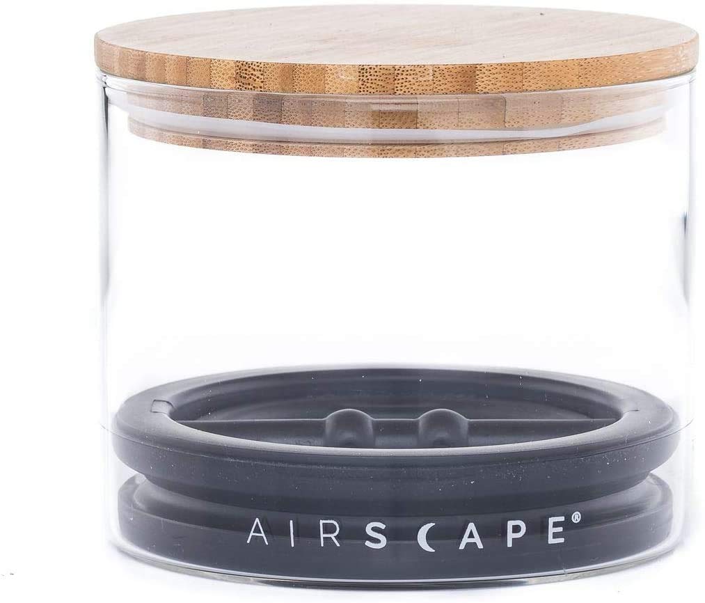 AirScape glass storage canister with inner-lid plunger expels air to keep dry goods fresher