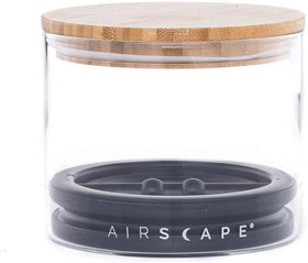 AirScape glass storage canister with inner-lid plunger expels air to keep dry goods fresher