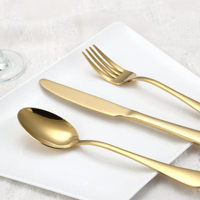 Aisoso Gold Silverware Set dinner fork close-up shows lustrous coating.