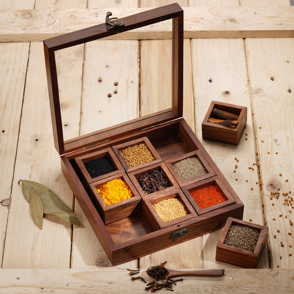 Ajuny wooden spice box with glass lid showing a 9x9 layout for quick spice access