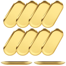 AKOLAFE gold 7-inch oval serving tray showcasing a stylish appetizer presentation