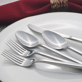 Alata Cube dinner spoon emphasizing sturdy forged construction.