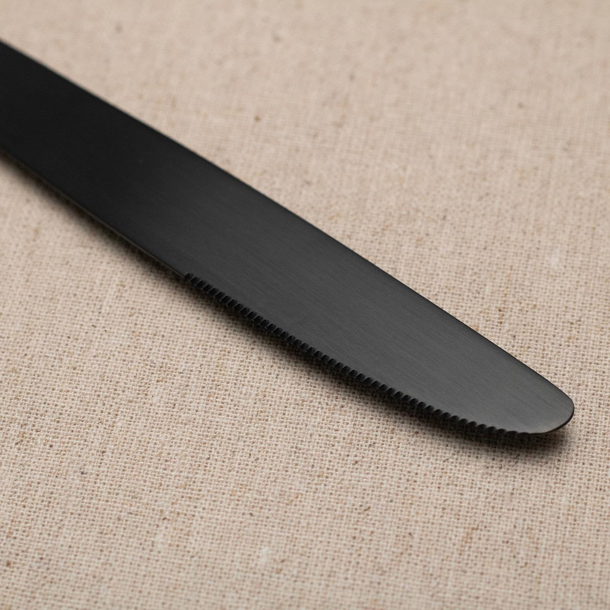 Alata Kate Black Satin dinner spoon for eight, smooth finish enhances meals.