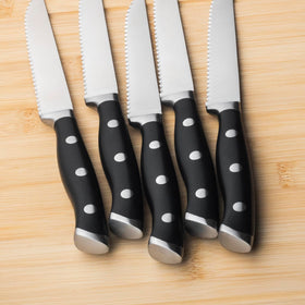 Alata steak knife with full-tang construction offers balanced control.